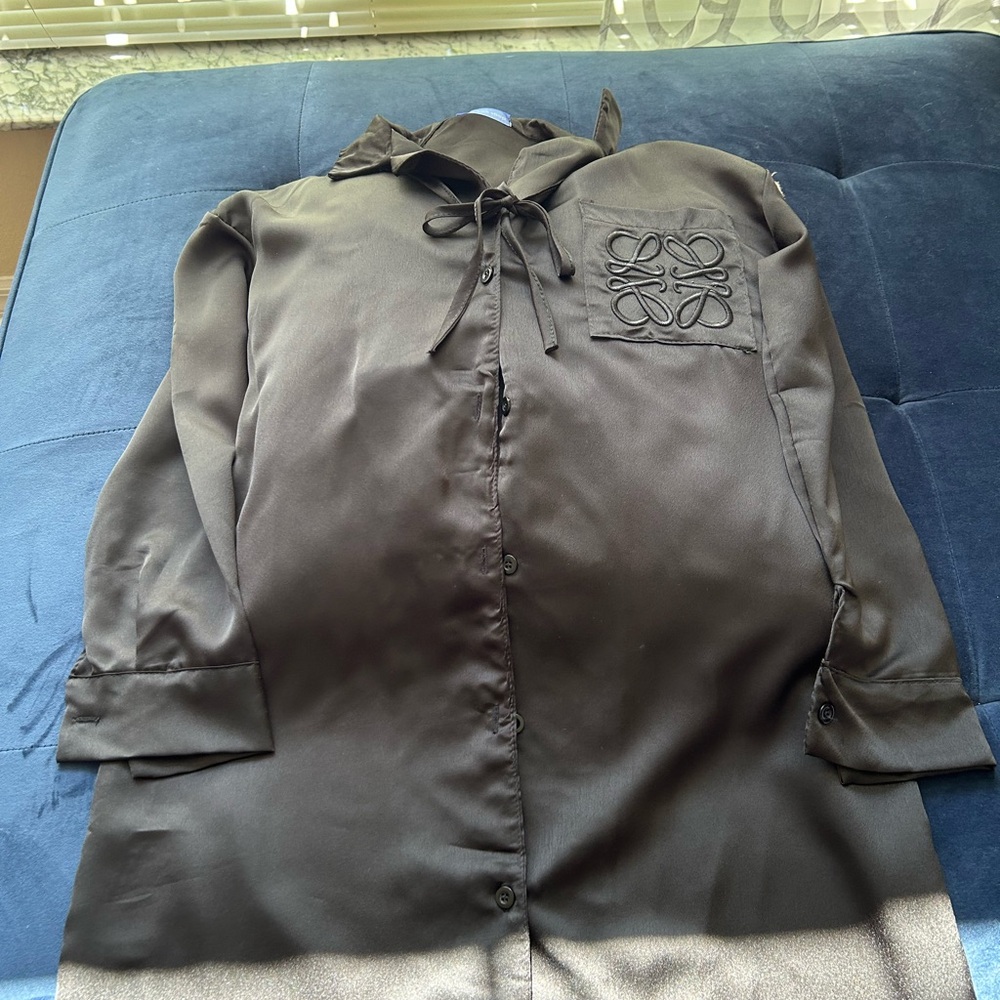 Black Button-Up Shirt with Embroidered Pocket it's like a silky material